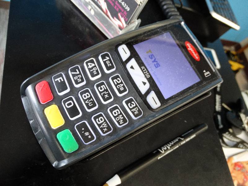 lot 616 image: Ingenico credit card machine.