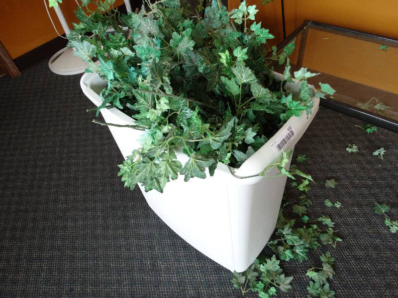 lot 632 image: Laundry basket wfake flowers.