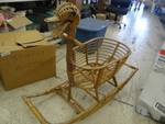 Old wooden duck rocking chair.