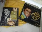Elvis memorabilia & 2 flags.