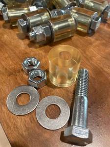 lot 32102 image: Bushing 3 inch (32 count) Includes 2 nuts and 2 washers each (unknown)