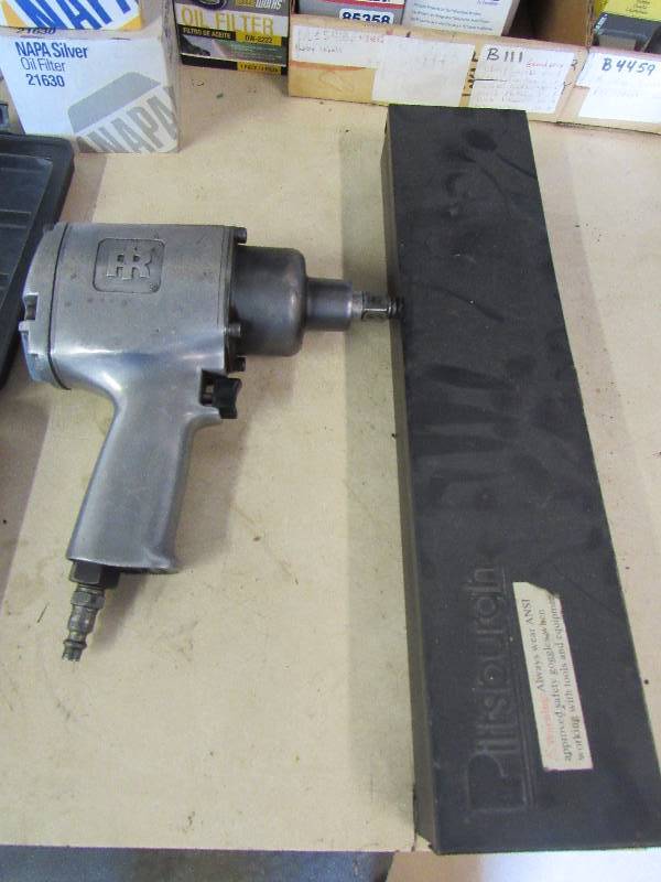 lot 1936 image: Ingersoll Rand 12 Impact Driver With Metric Impact Socket Set