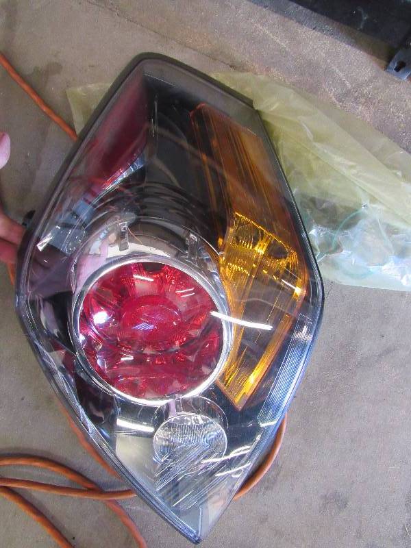 lot 1951 image: New 07-12 Nissan Altima Drivers Side Tail Light Assembly