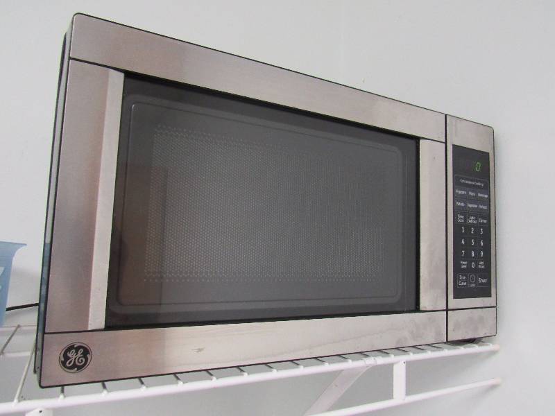 lot 1978 image: GE Residential Microwave And Black And Decker Counter To Coffee Maker