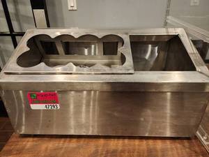 lot 47293 image: Stainless Steel Squeeze Bottle Holder