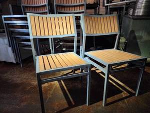lot 47322 image: Lot of 4 Stackable Metal and Wood Slat Chairs