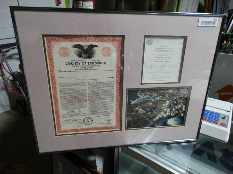lot 452 image: Framed Airport Facility Revenue Bond. Sedgwick county Airport Revenue bond certificate