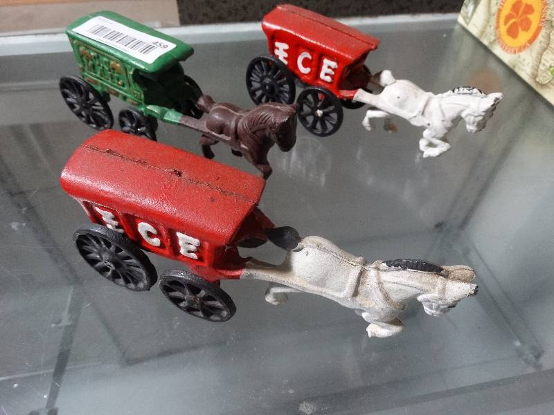 lot 459 image: 3 cast iron pull toys - horse and carriage