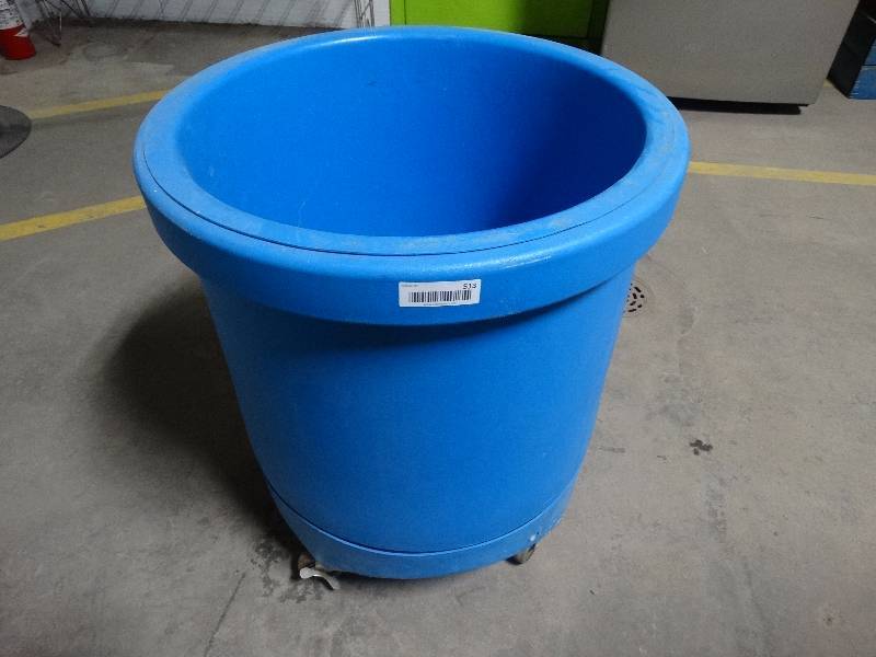 lot 513 image: blue plastic beer cooler on wheels.
