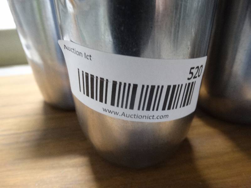 lot 520 image: Lot of 18 metal syrup pitchers.