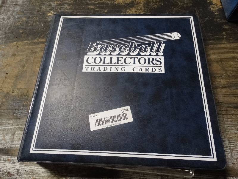 lot 574 image: baseball card magazines in protector sleeves w binder