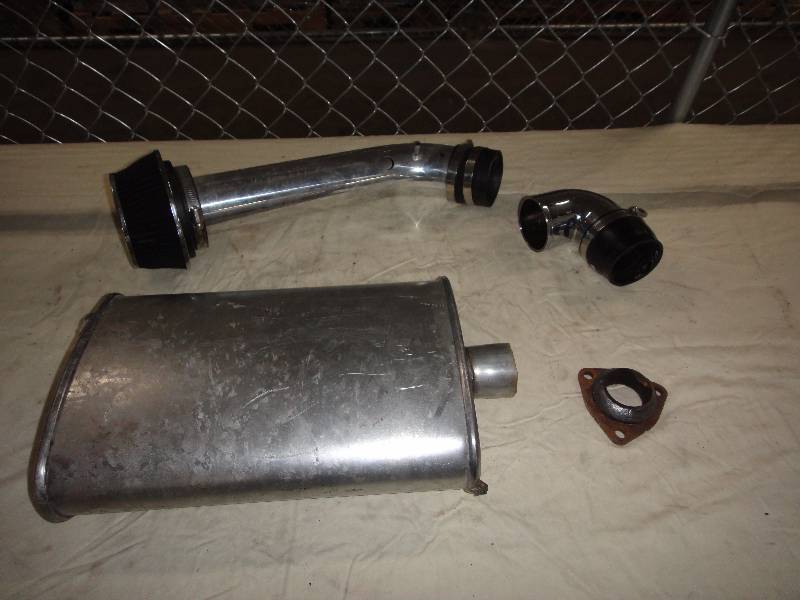 lot 897 image: Muffler and more