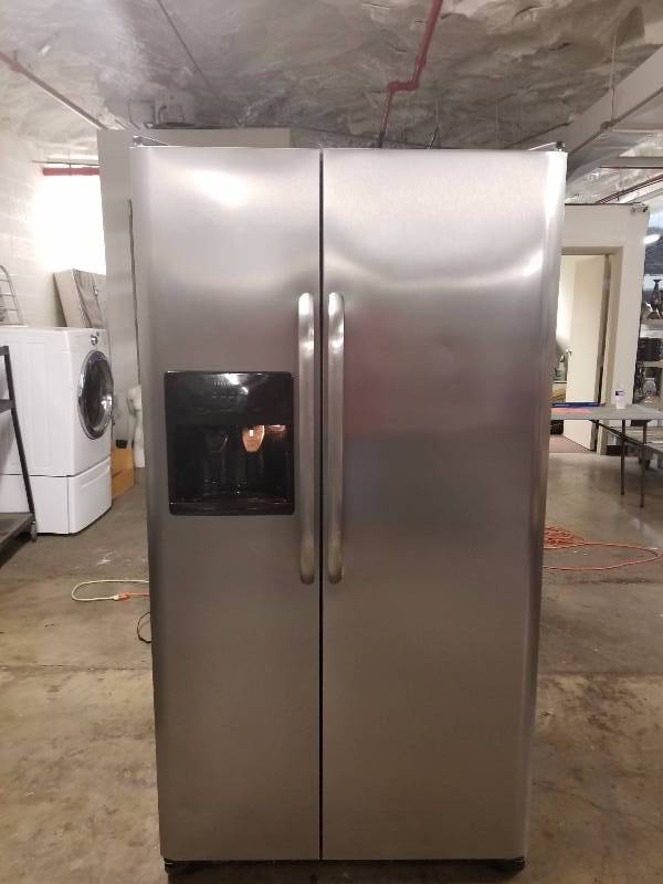 lot 13 image: Frigidaire 26-cu ft Side-by-Side Refrigerator with Ice Maker