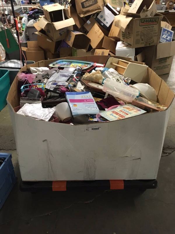 lot 1216 image: Gaylord with Large Quantity of Swap and Shop Random Items Gaylord not included bring your own bags or totes