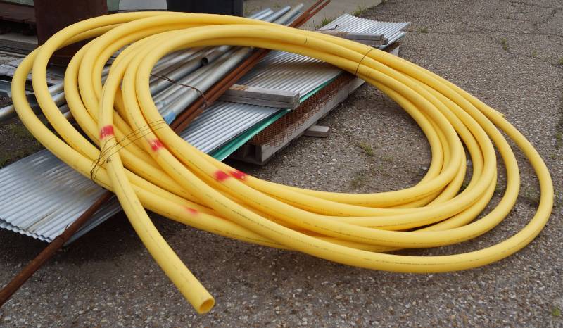 lot 4034 image: Big Roll of Large Diameter - 2 Dura-Line - POLYPIPE - GAS - PE 2406 - ASTM D2513 - See photo for print line.
