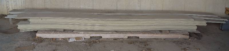 lot 4070 image: Lot of siding - Various  Sizes and Pieces - Longest Pieces are 16 feet. - Handy
