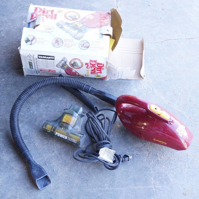 lot 9132 image: Dirt Devil - Scorpion Portable Vacuum - with box