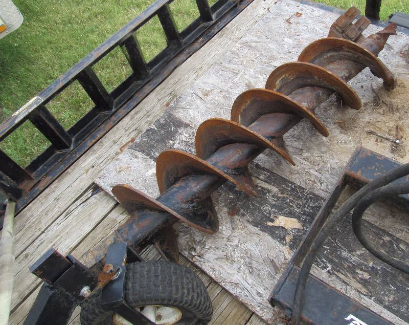 lot 7698 image: Lowe Skid - Steer or Bobcat Auger Implement  Attachment w Bit WOW