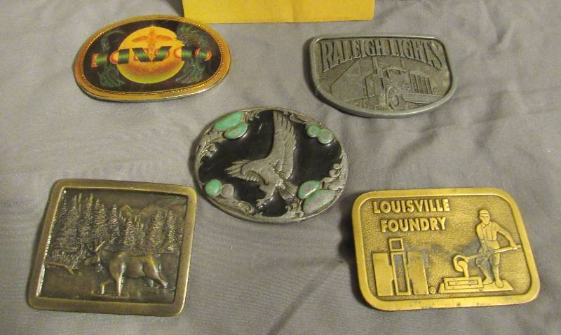 lot 7700 image: Lot of 5 Vintage Belt Buckles - Kansas, Raleigh Lights, Eagle, Louisville Foundry and Kansas