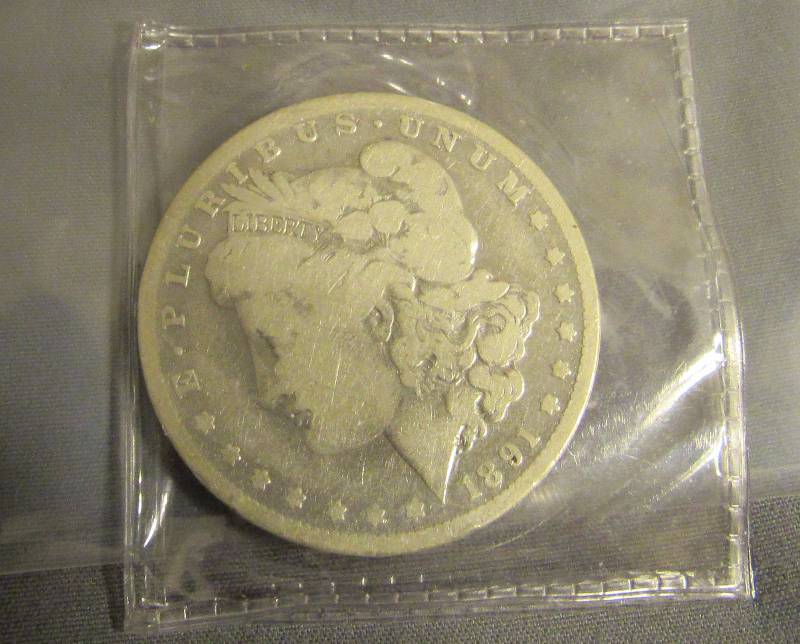 lot 7706 image: 1891 Morgan Silver Dollar - New Orleans Mint