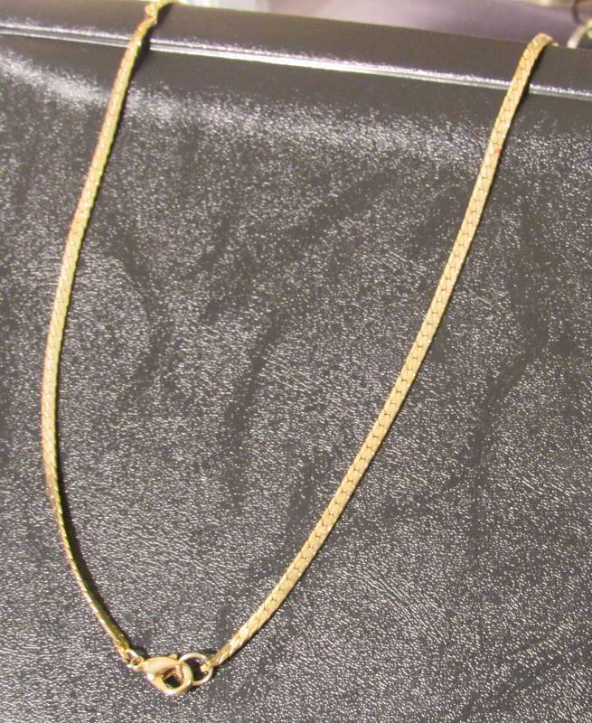 lot 7715 image: Gold Braided Chain (doesnt appear to be gold) 7.38 grams