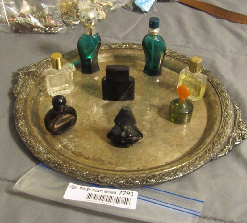 lot 7791 image: Assortment of 8 different mens cologne bottles