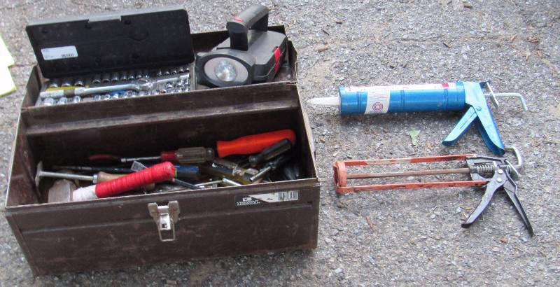 lot 7799 image: Brown Tool Box FULL of tools and 2 caulking guns - see photos for tools that are included
