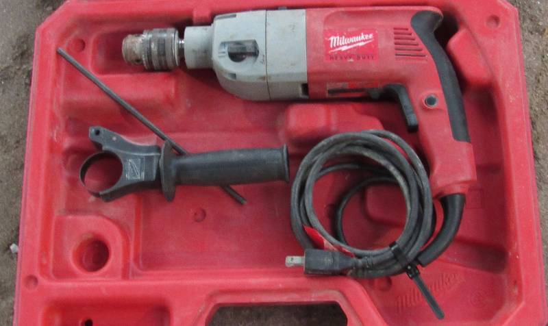 lot 7847 image: Milwaukee - Hammer Drill Heavy Duty - with case Works