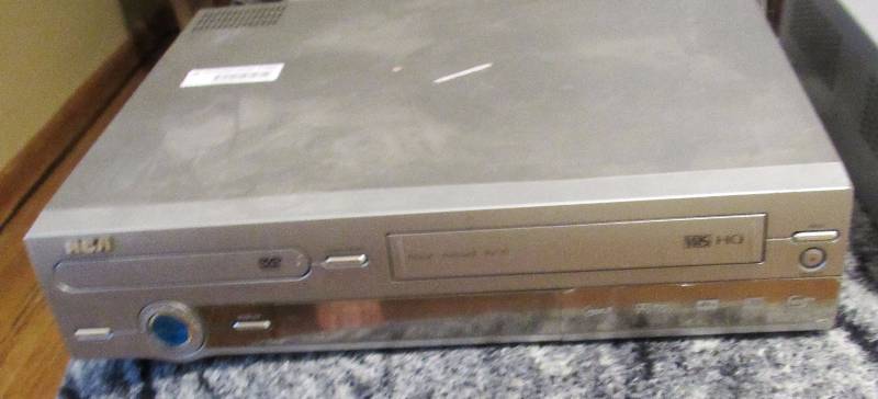 lot 7795 image: RCA Dual DVD & VHS Player - works