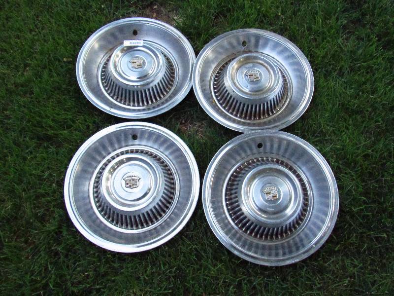 lot 7951 image: Set of Four Cadillac Hub Caps - Vintage - Nice Condition for their age. See photos