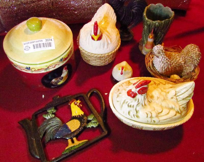 lot 2074 image: Lot of Rooster Kitchen Dcor - Cookie Jar, Vase, Ceramic Dish with lid, Metal trivet, and more Take a peep