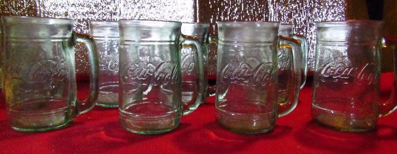 lot 2075 image: Lot of 7 Coca-Cola Mugs - Green Glass - Have a Coke and Smile