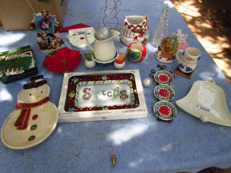 lot 2082 image: Lot of Christmas Decorations - plates, serving platters, snowmen, Santa figurines and more - see photo