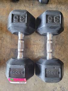 lot 9187 image: Pair of Rogue Rubber Coated 35lb Dumbbells