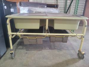 lot 22716 image: Mobile Green Sensory Water Play Table W an Assortment of Toys