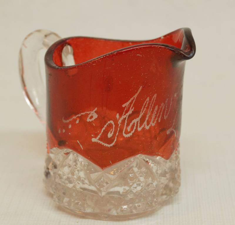 lot 2446 image: Vintage Red Cut To Clear - Small Pitcher dated 1908