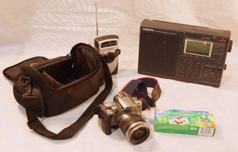 lot 5107 image: Canon Camera and 2 old Radios