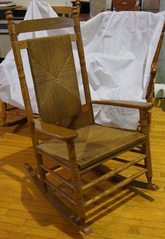 lot 9240 image: Rocking Chair - Wood w wicker covered seat and back - Great Condition - See Next Lot for matching chair - VERY NICE