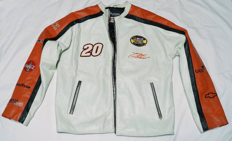 lot 1312 image: ATTN NASCAR FANS - Heres your jacket  MENS LEATHER - TONY STEWART #20 Sponsor Embroidered Leather Jacket - VERY NICE Mens Size Large by WILSONS LEATHER