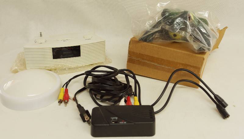 lot 5291 image: Misc Electronics - Battery Radio, Tap Light, Channel Switcher, Cables and Motion Activated FROG - NEW