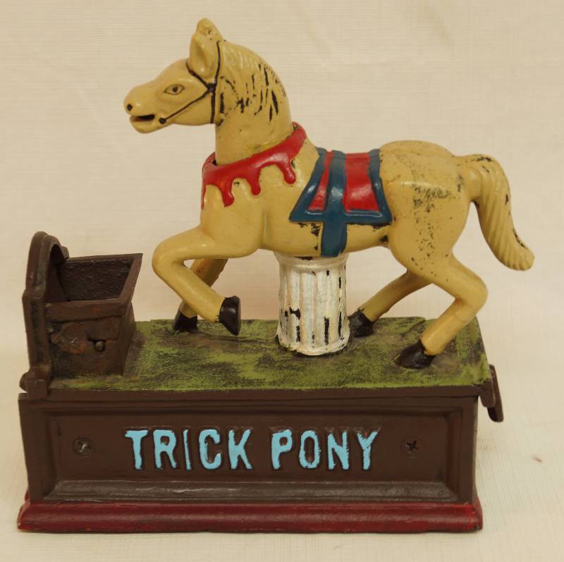 lot 9258 image: Nostalgic Cast Iron Coin Bank - TRICK PONY - WORKS