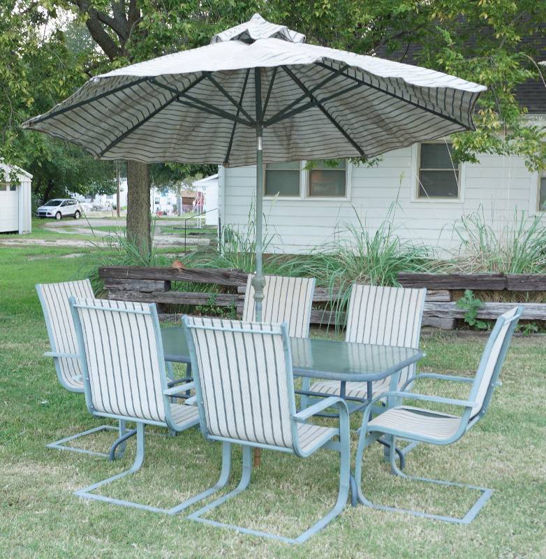 lot 9281 image: 8 piece patio table and chairs set - Includes 6 chairs, 1 table and 1 umbrella - Nice - Chairs need new coverings