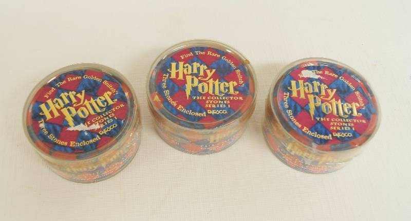 lot 9032 image: 3 containers of Harry Potter - Collector Stones - Series 1 in original package wpapers - 9 stones