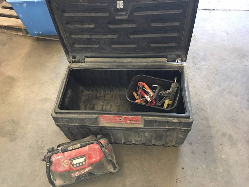 lot 136 image: Milwaukee radio, tool box, caulk guns