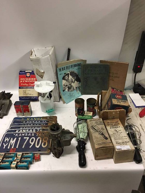 lot 195 image: VINTAGE AUTO PARTS LICENSE PLATES AND MORE