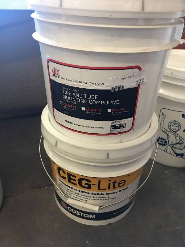 lot 222 image: TIRE LUBE & EPOXY GROUT