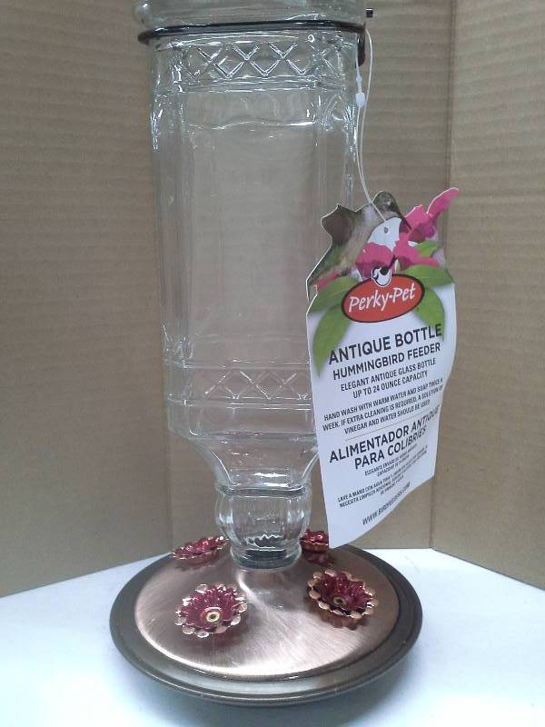 lot 8450 image: Glass Antique Bottle Hummingbird Feeder, Clear