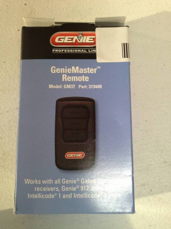 lot 8486 image: Genie GM3T-BX Garage Door Opener, Intellicode Dual Frequency 315390 MHz Remote - 3-Button Transmitter
