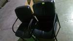 Two Leather Office Chairs With Extra Seat Coverings