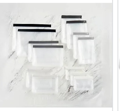 lot 410009 image: Retail - $36.25 Ecolution 13-Piece Reusable Stand-Up Food Colors May Vary